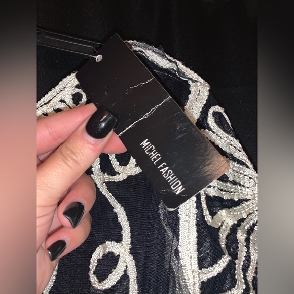 Selling a black cute blouse for women, brand is Michel Fashion size small! - Picture 3 of 4